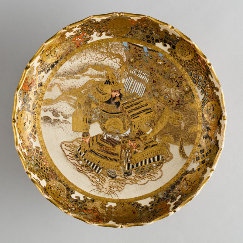 Anonymous artist - Dish decorated with figure of the warrior Katō Kiyomasa seated on a tiger skin