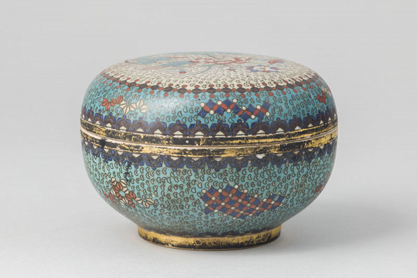 Anonymous artist - Round covered container with geometrical and floral design 