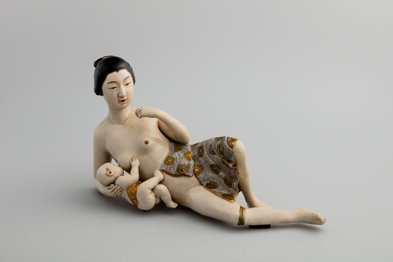Anonymous artist - Woman breastfeeding a baby boy